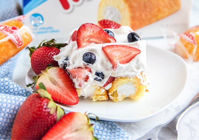 patriotic twinkie cake with strawberries and blueberries