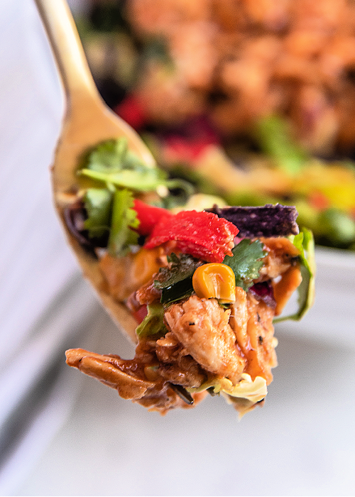 a forkful of bbq chicken chopped salad