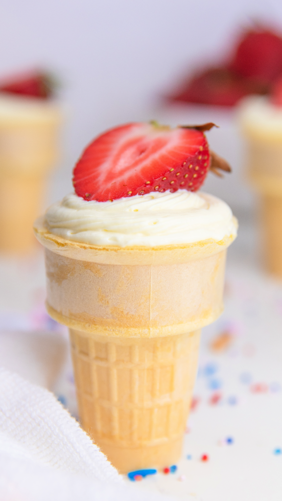 cheesecake cones with a strawberry on top a simple summer dessert recipe
