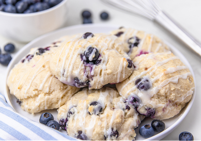 4 Ingredient Blueberry Biscuits piled on a white serving platter