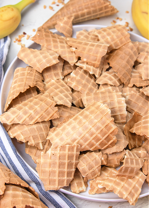 broken pieces of waffle cone on a white serving tray