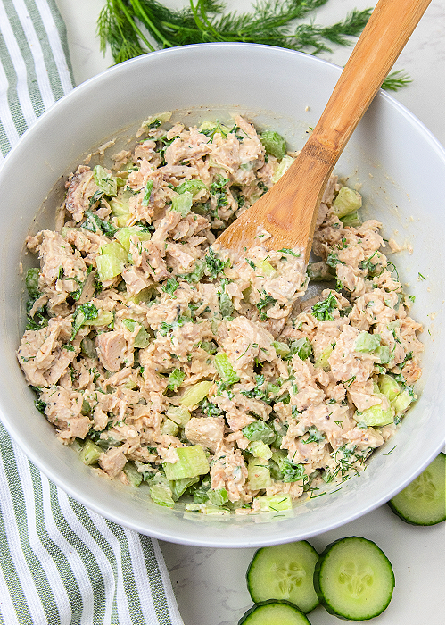 chicken salad in a white serving bowl