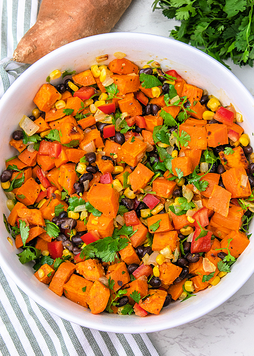 roasted sweet potato salad in a large serving bowl