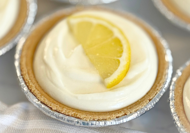 3 ingredient cheesecake with a slice of lemon on top