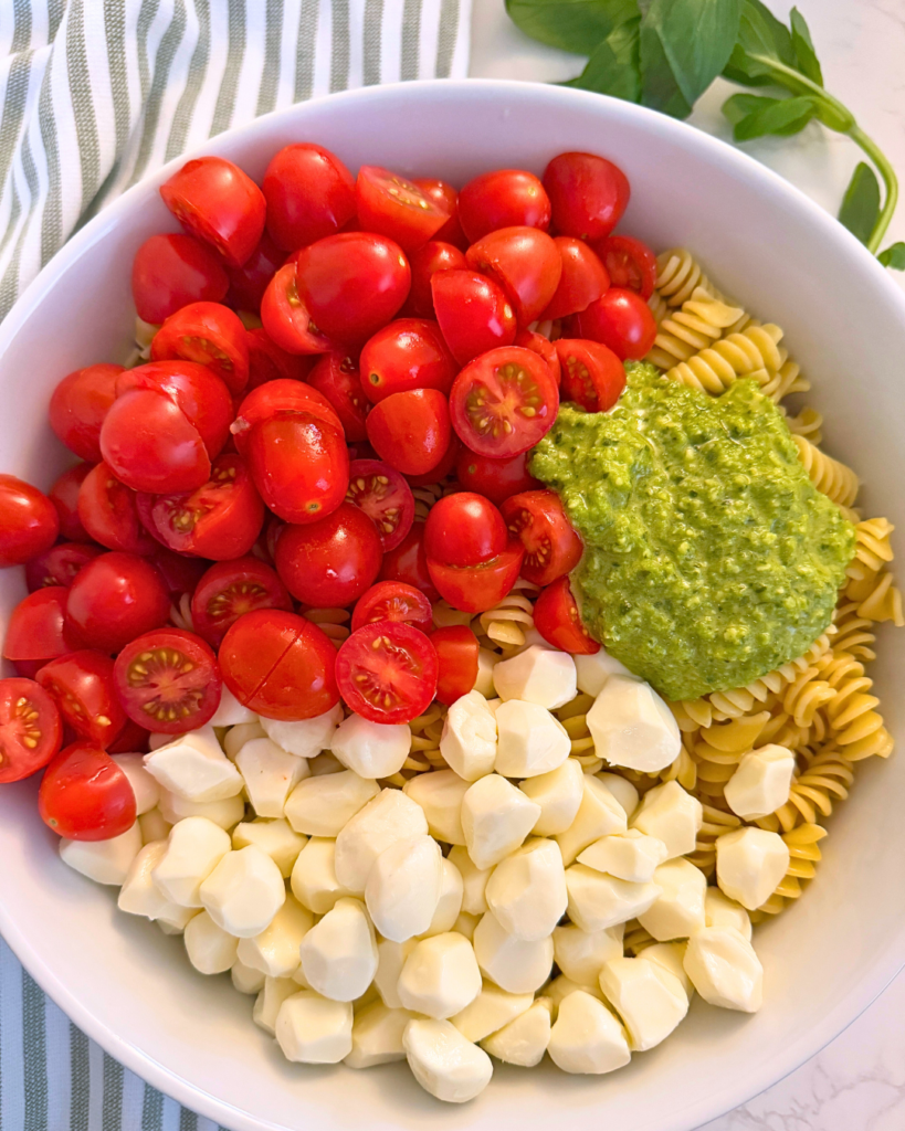 4 ingredient pasta salad ingredients in a bowl